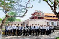 Teenage Boys in Suits Standing in front of the Imperial City, Hue