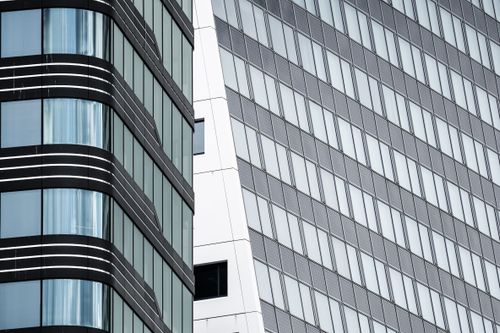 Free Close-up of modern skyscrapers showcasing geometric designs and urban architecture. Stock Photo