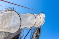Hanging Fishing Nets on the Background of a Blue Sky