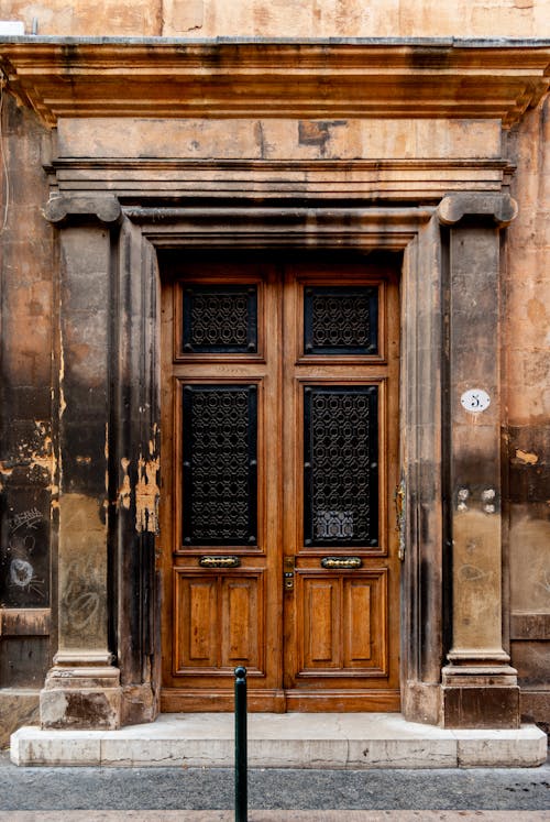 Free Brown Wooden Door Entrance of an Old Building Stock Photo