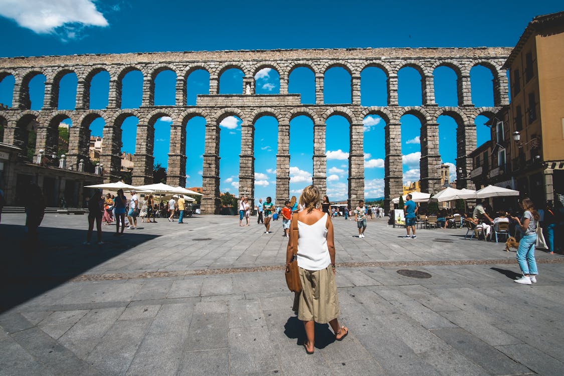 Free Tourists Visits the Aqueduct in Segovia Spain Stock Photo
