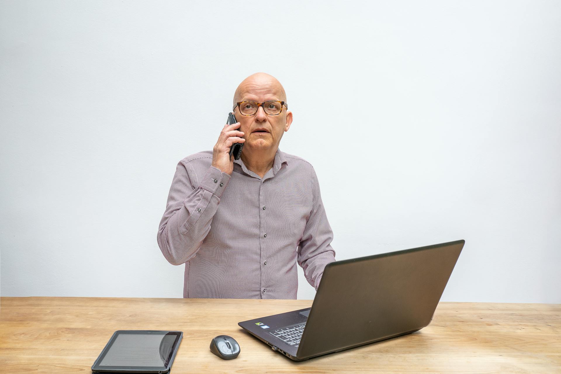 Portrait of Man Using Technology