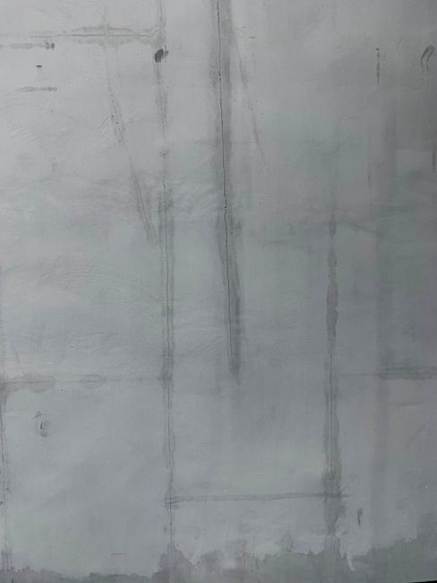 A concrete wall showcasing subtle texture and design elements, ideal for backgrounds.