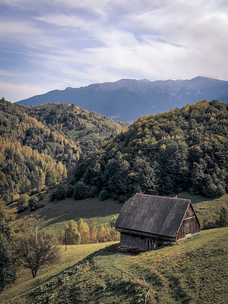 Old Wooden House On Hill In Mountains