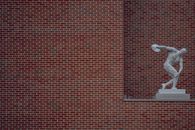 Red Brick Wall With White Heart Sticker