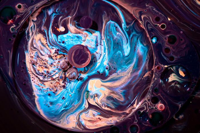 Colorful swirling liquid macro photography