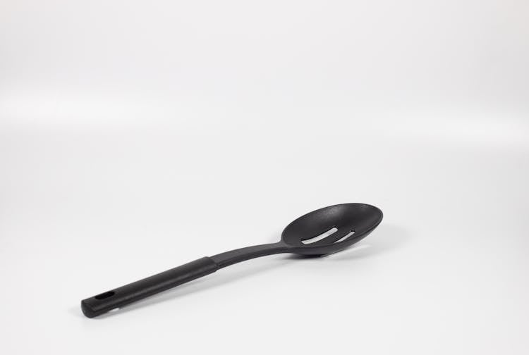 Black Spoon On White Background