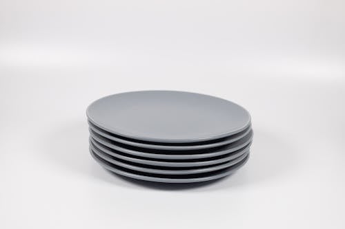 Free Gray Plates on White Background Stock Photo