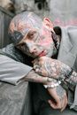 Person With Tattoo on Left Hand