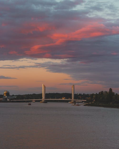 Bridge over River during Sunset