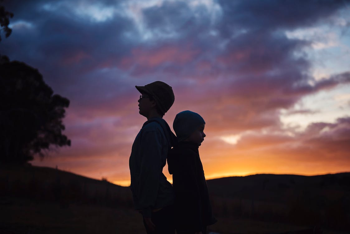 Silhouette Photography of Two Children's