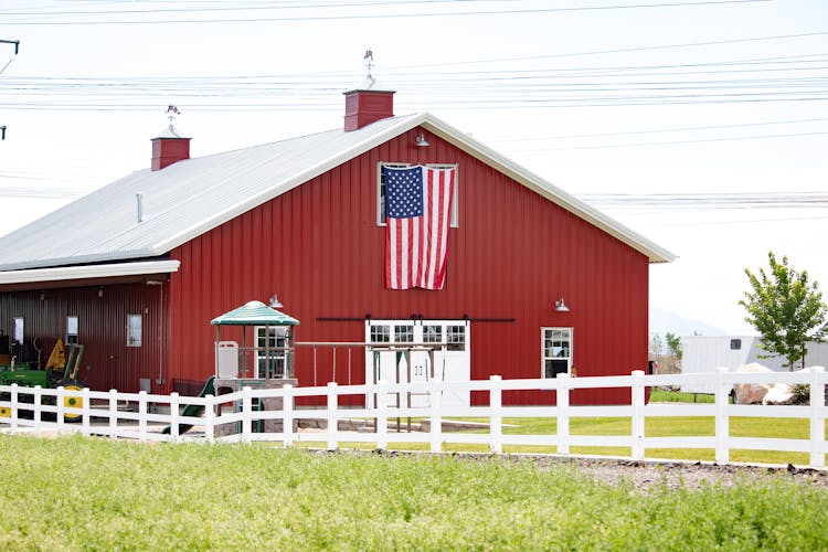 A Barn With An American Flag