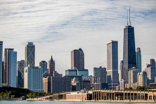 Free Stunning view of Chicago skyline featuring famous skyscrapers and urban architecture under a cloudy sky. Stock Photo
