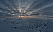 Unusual Phenomenon of Gods Glory in Winter Cloudy Sky