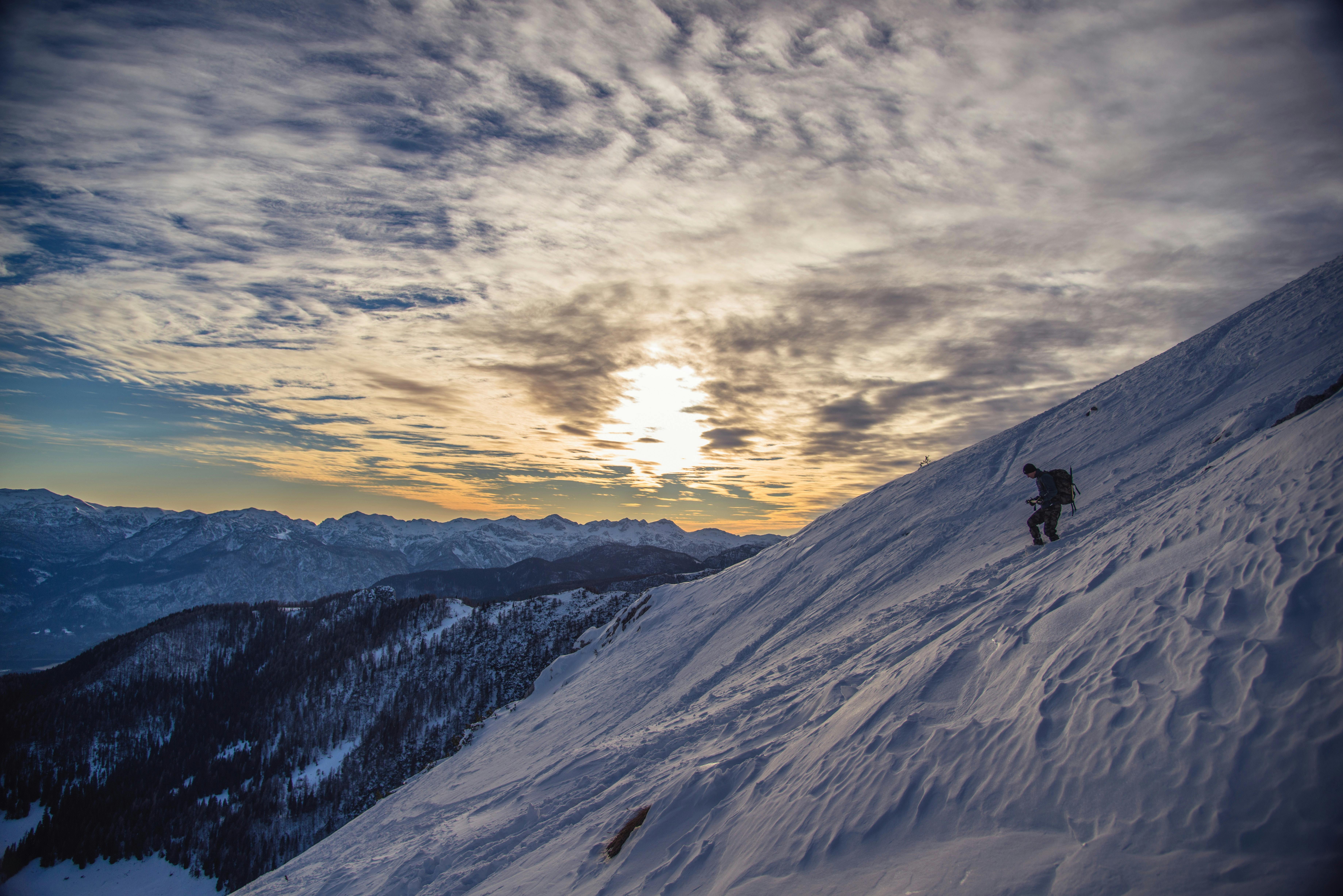 person on snow covered mountain