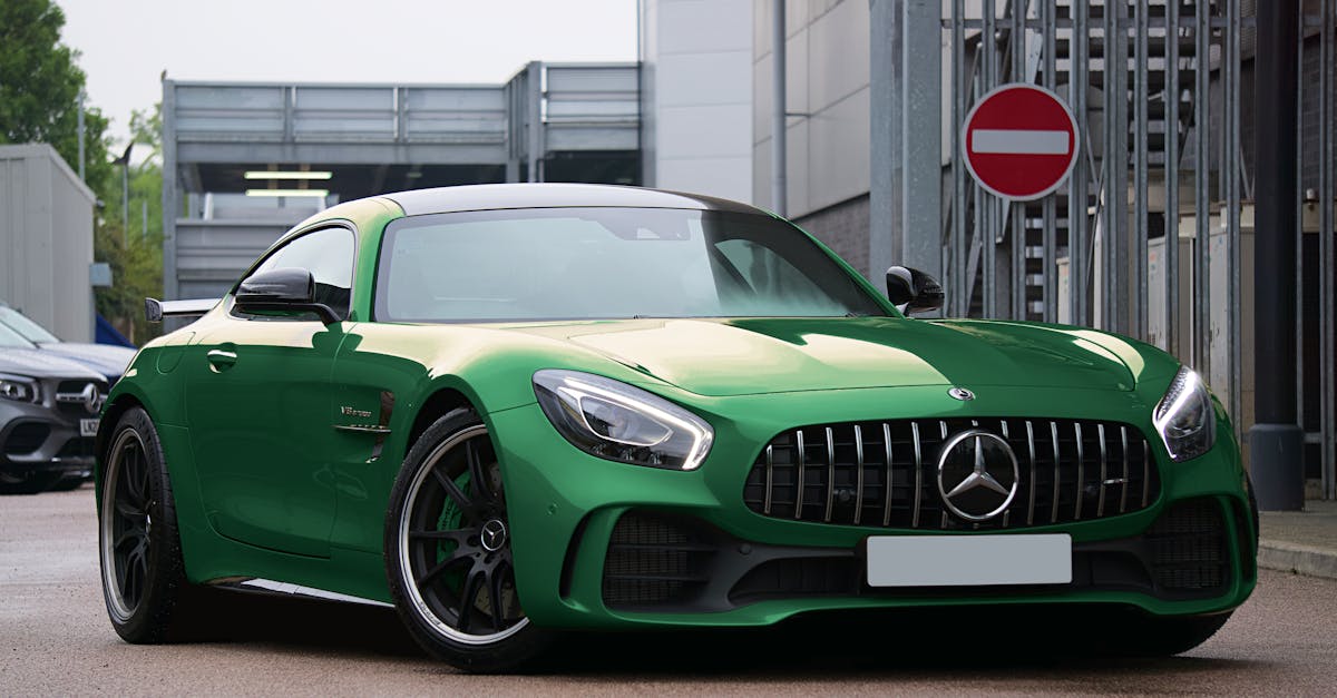 Green Mercedes Benz Parked on the Street · Free Stock Photo