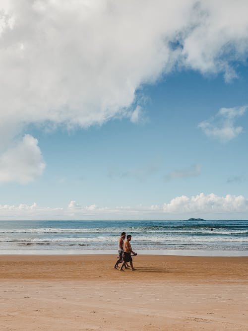 People Walking at the Beach