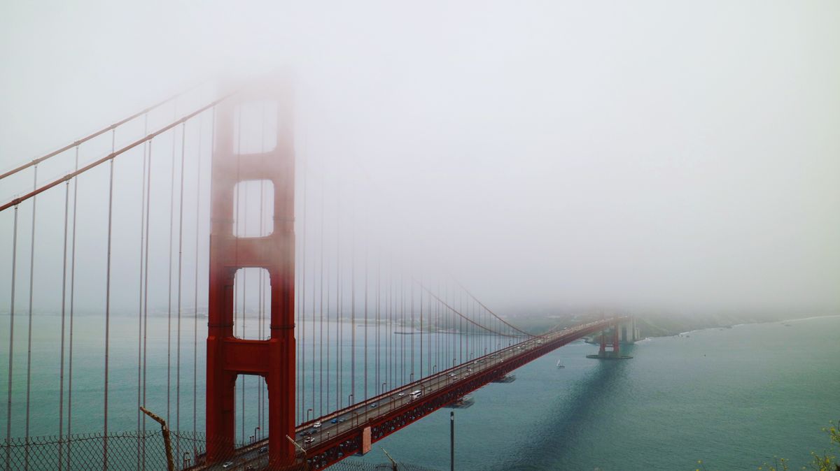 Golden Gate Bridge partly veiled in fog