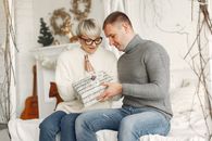 Husband Giving His Wife Christmas Present