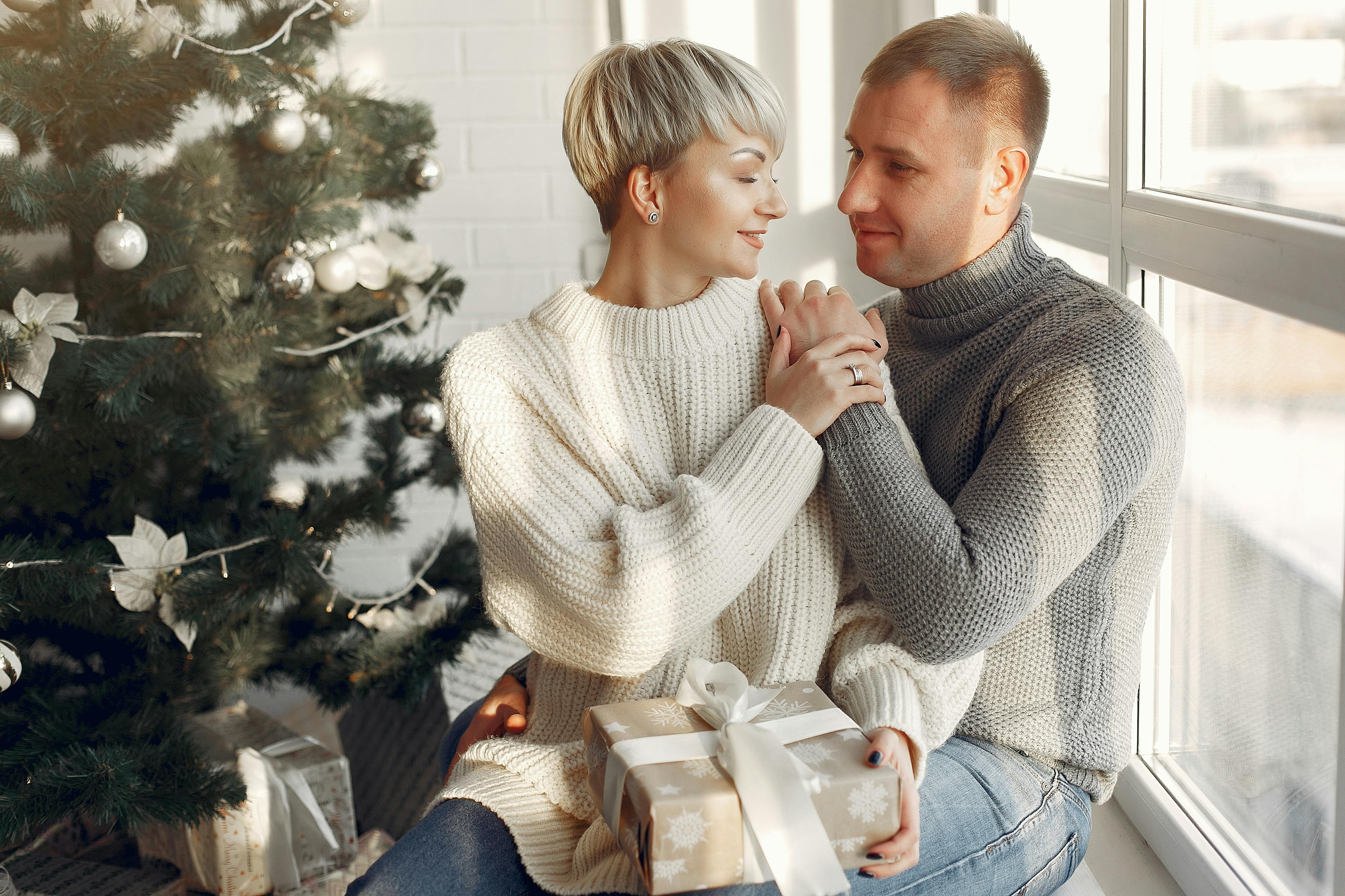 Elderly Woman Sitting Near Christmas Tree Stock Photo 1245796264