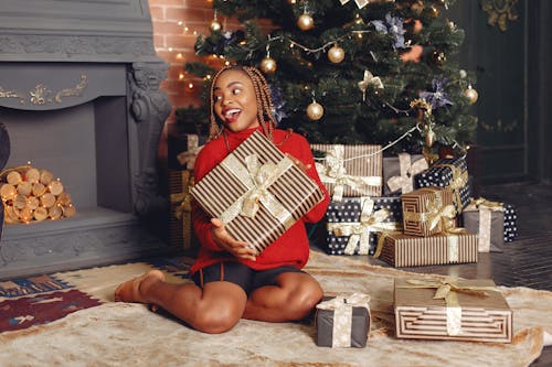 Happy Woman with Christmas Gift