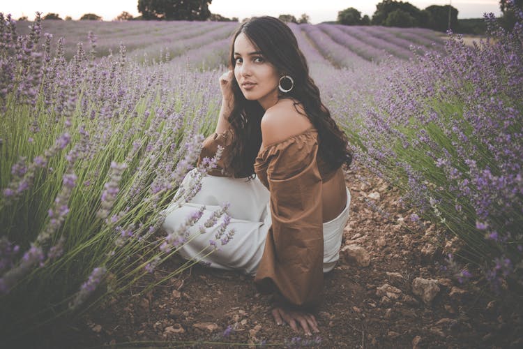 Woman Sitting On Lavender Fields
