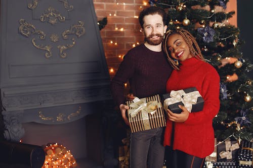 Happy Couple with Christmas Gifts