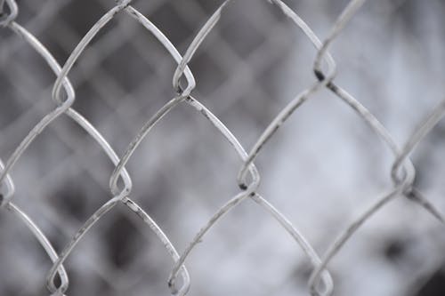 Free Grey Metal Fence in Close Up Photography Stock Photo