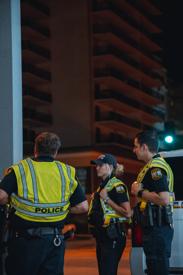 Police Officers On Duty At Night