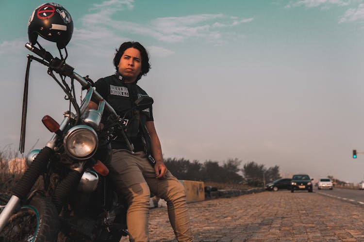 A Police Officer Patrolling A Highway