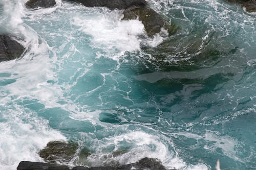 Wave Crashing into Rocks