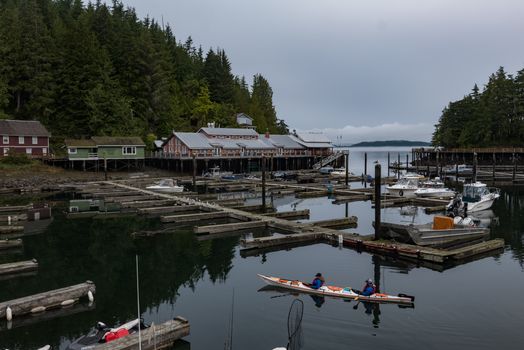 Brown Wooden House Near Body of Water