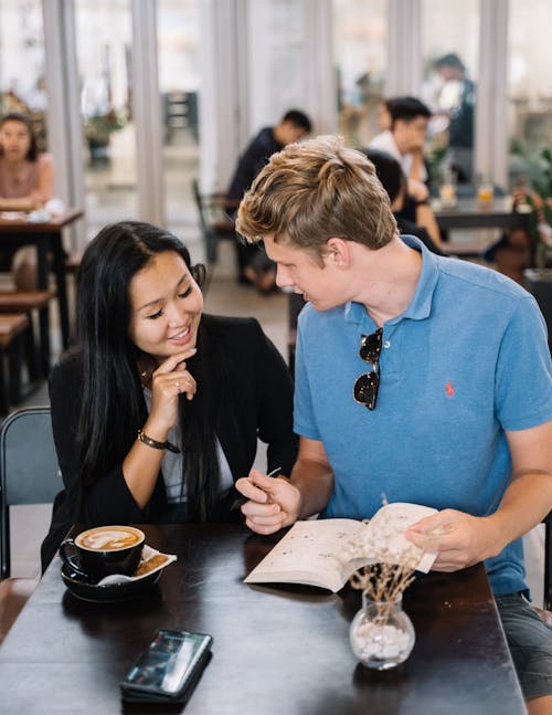 Two People in a Cafe