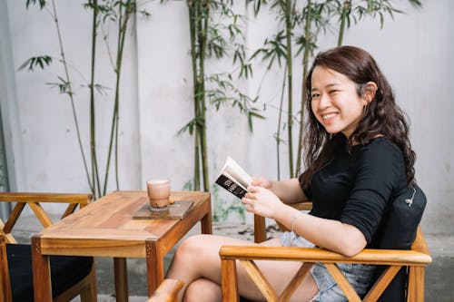 A Woman Sitting with a Book