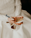 Person Holding White and Black Pen