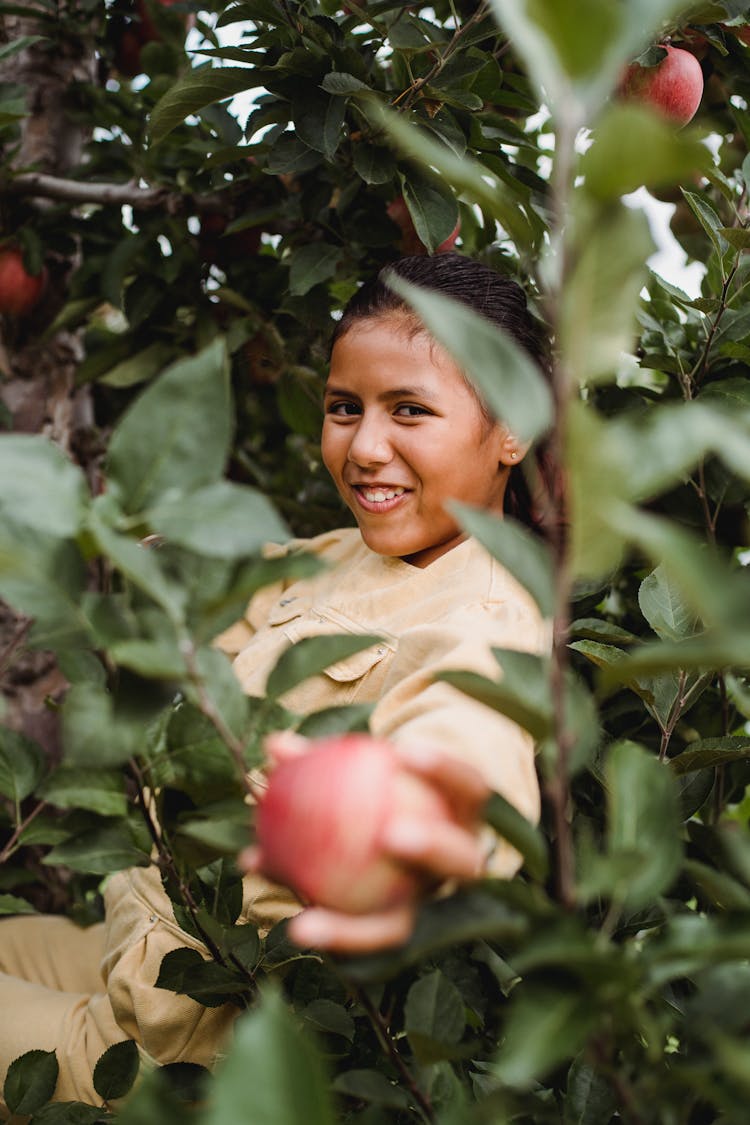 Latin American Teen Girl With Apple