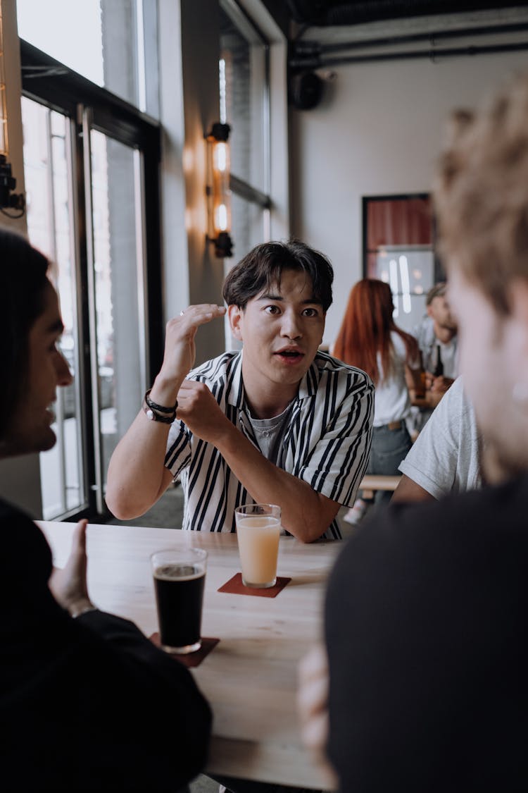 Group Of Men Having A Drink