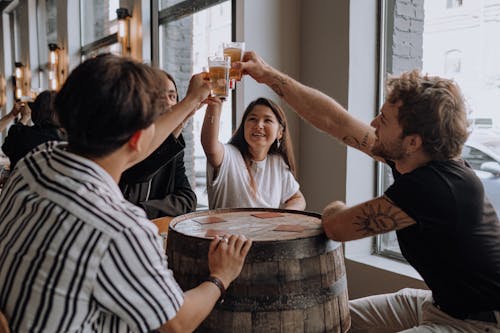 Photograph of a Group of Friends Drinking Beer