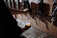 Person Holding Clear Drinking Glass