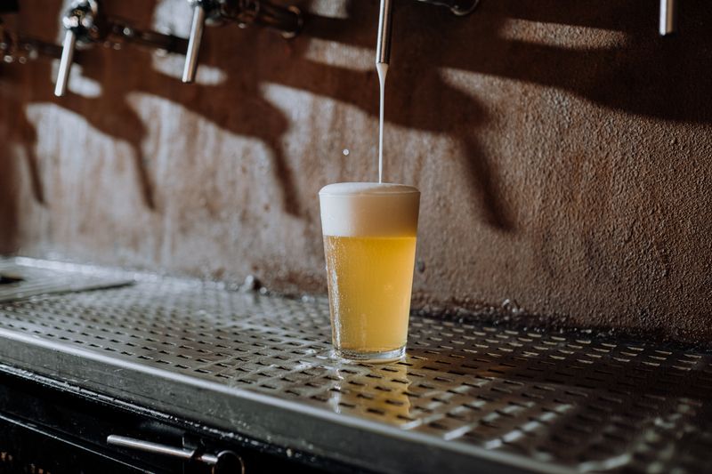 Fresh craft beers raised for a toast inside the Ironside Brewing Co. taproom