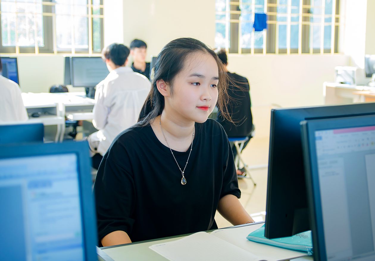 Woman concentrating on a computer