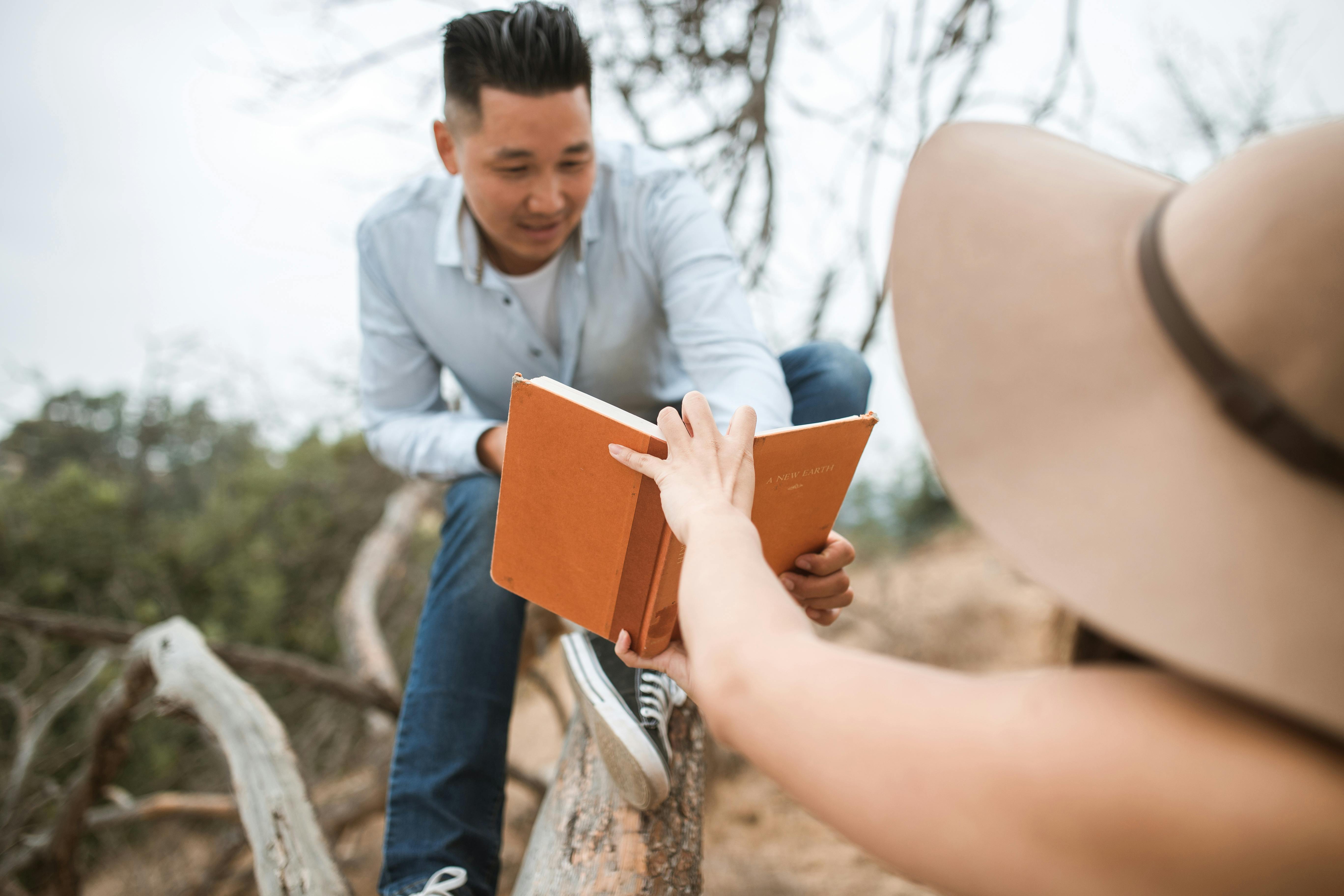 couple reading a book on a date