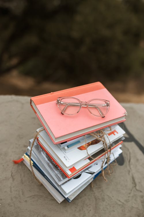 Eyeglasses on Stack Of Books