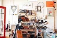 Assorted purses on shelves in shop
