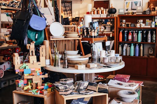 Free Table with various goods in shop Stock Photo