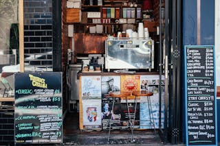 Street cafe counter with signboards