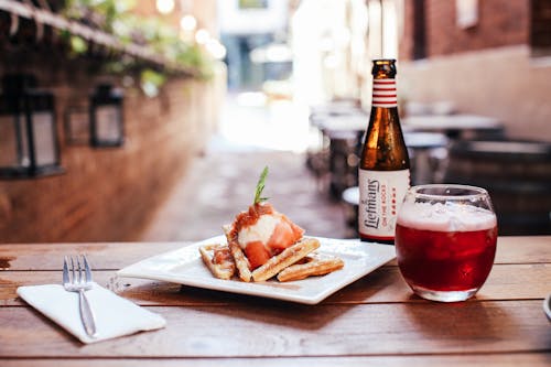 Free Beer and Waffles on Table Stock Photo