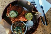 Cooked Food on Black Ceramic Plate