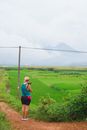 Woman Photographing a Landscape 