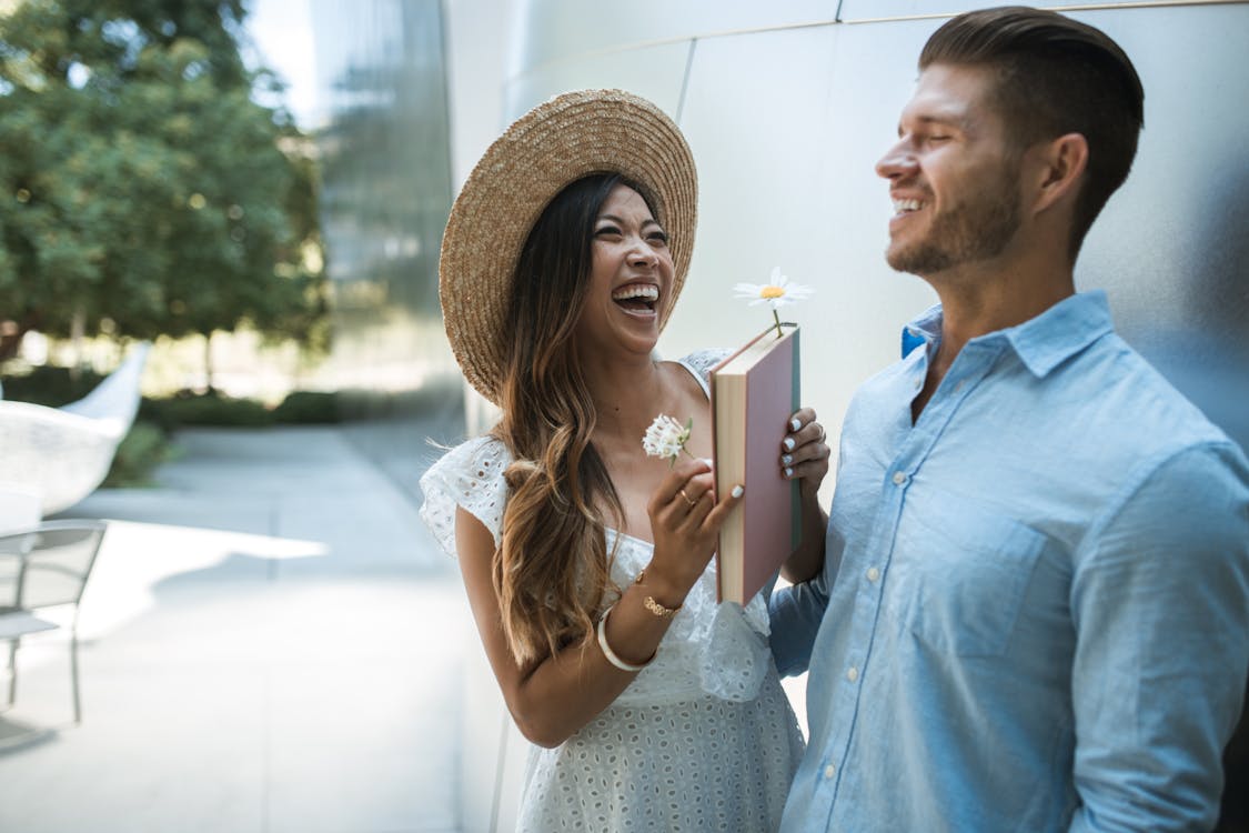 Free A Happy Couple Laughing Together Stock Photo